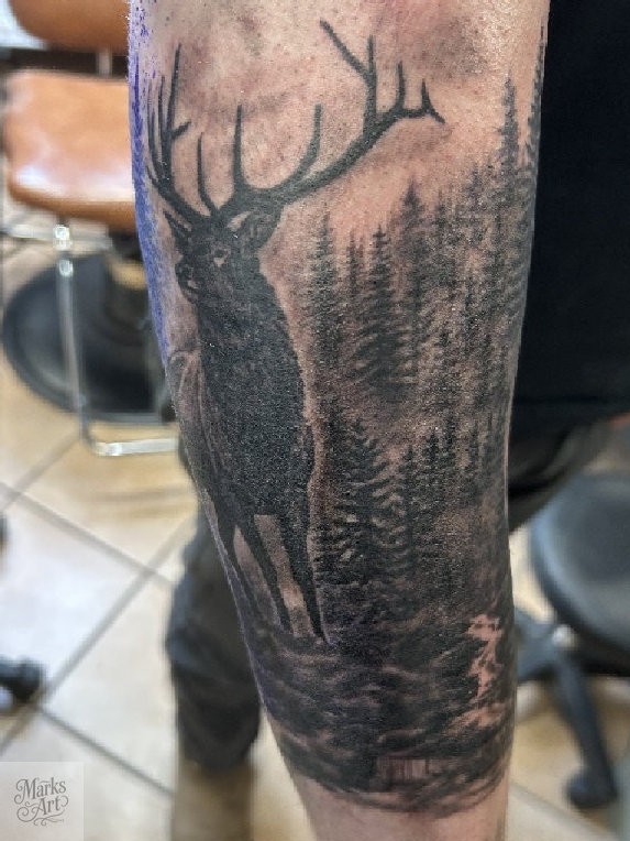 Elk in Forest Wildlife Tattoo Realistic elk and forest tattoo by Marks Art LLC in Rapid City, South Dakota.